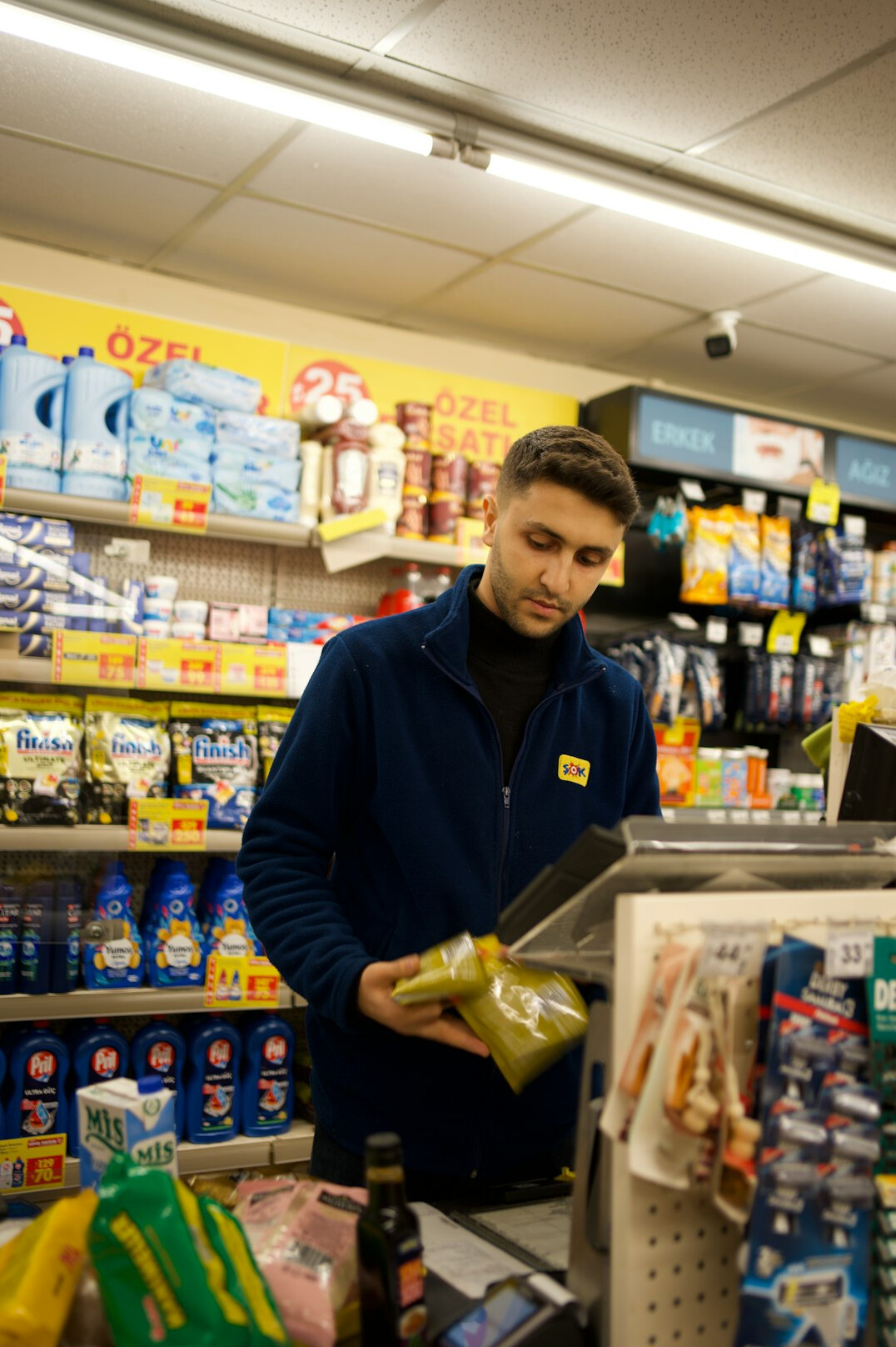 man running in grocery store