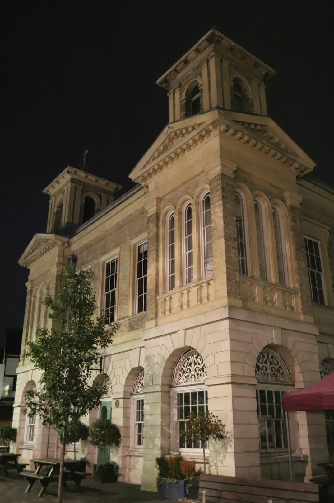 Old stone courthouse facade at dusk