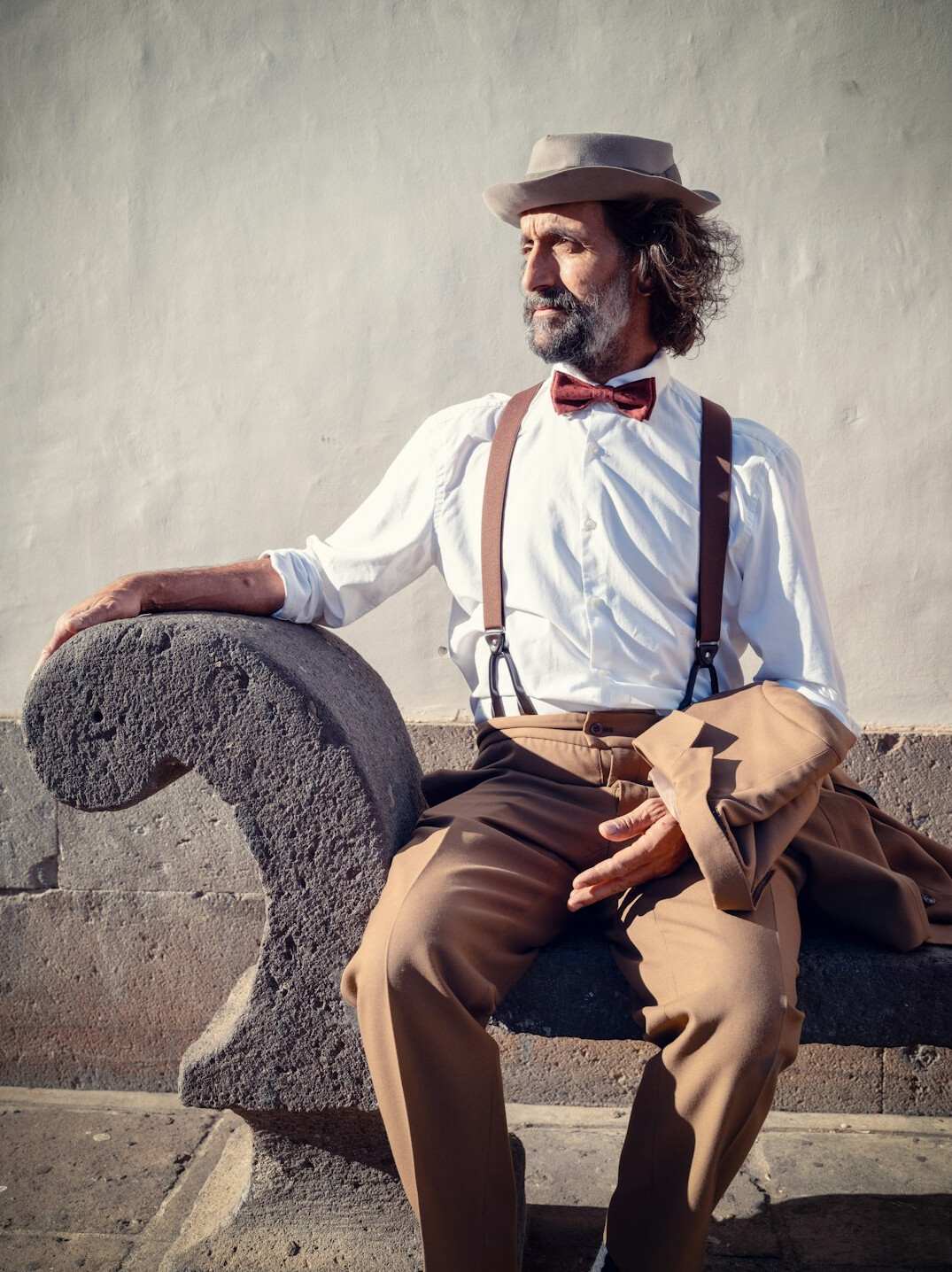 Studio portrait of a Uruguayan man in his 60s, historian